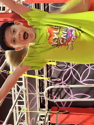 Child playing at trampoline park